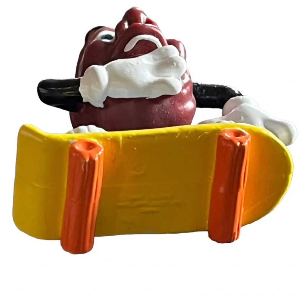 Vintage 1980s California Raisins Figure Riding a Skateboard Cake Topper